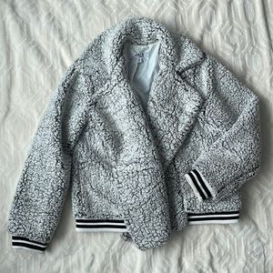 White and black fluffy Sherpa coat from Evereve.